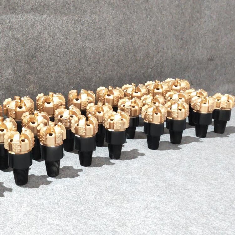 Rock Drill PDC Diamond Bit Alloy Carbon Steel Untuk Pertambangan Batubara Rigs Pengeboran sumur air
